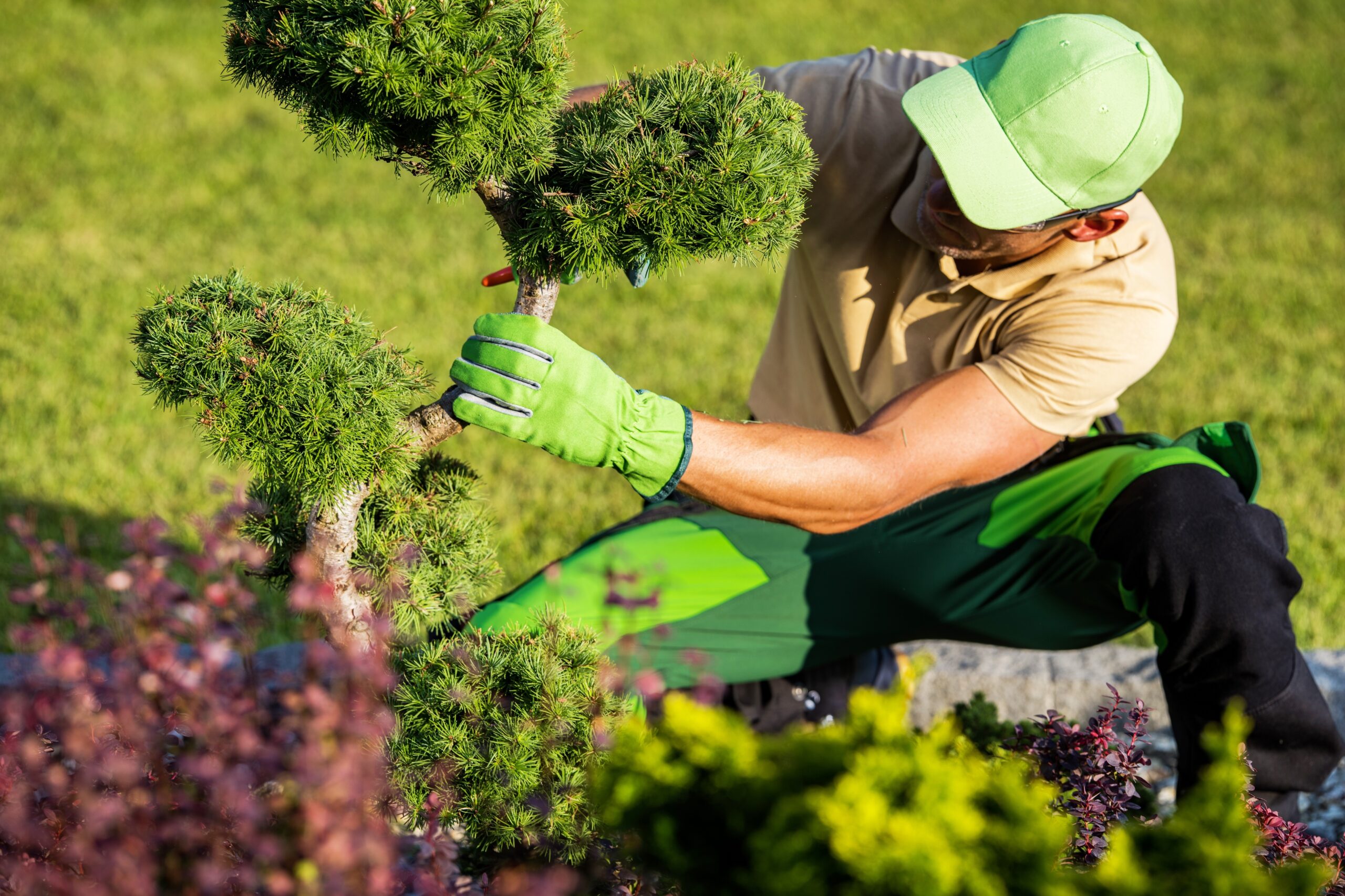 Landscaper working outside in the hot sun